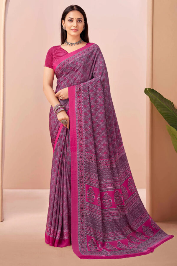 Model wearing purple-pink crape silk saree with ethnic motifs and border – Kiran Sarees