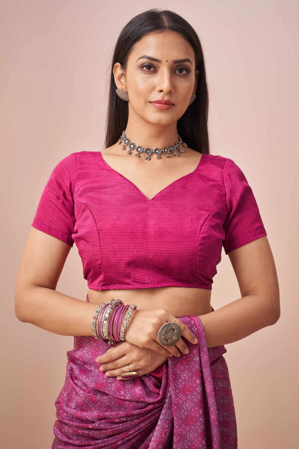 Matching blouse design with rich pink crape saree